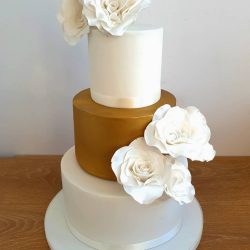 Gold and White Rose Wedding Cake